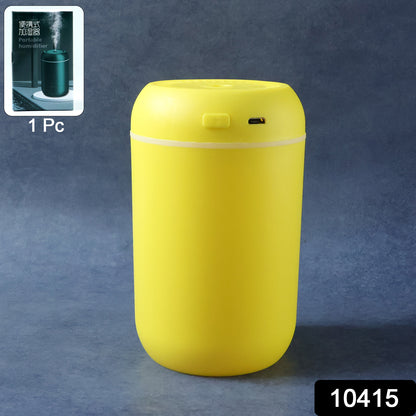Wukusy portable USB-powered mini air humidifier emitting mist, compact design ideal for desktop use in indoor spaces.