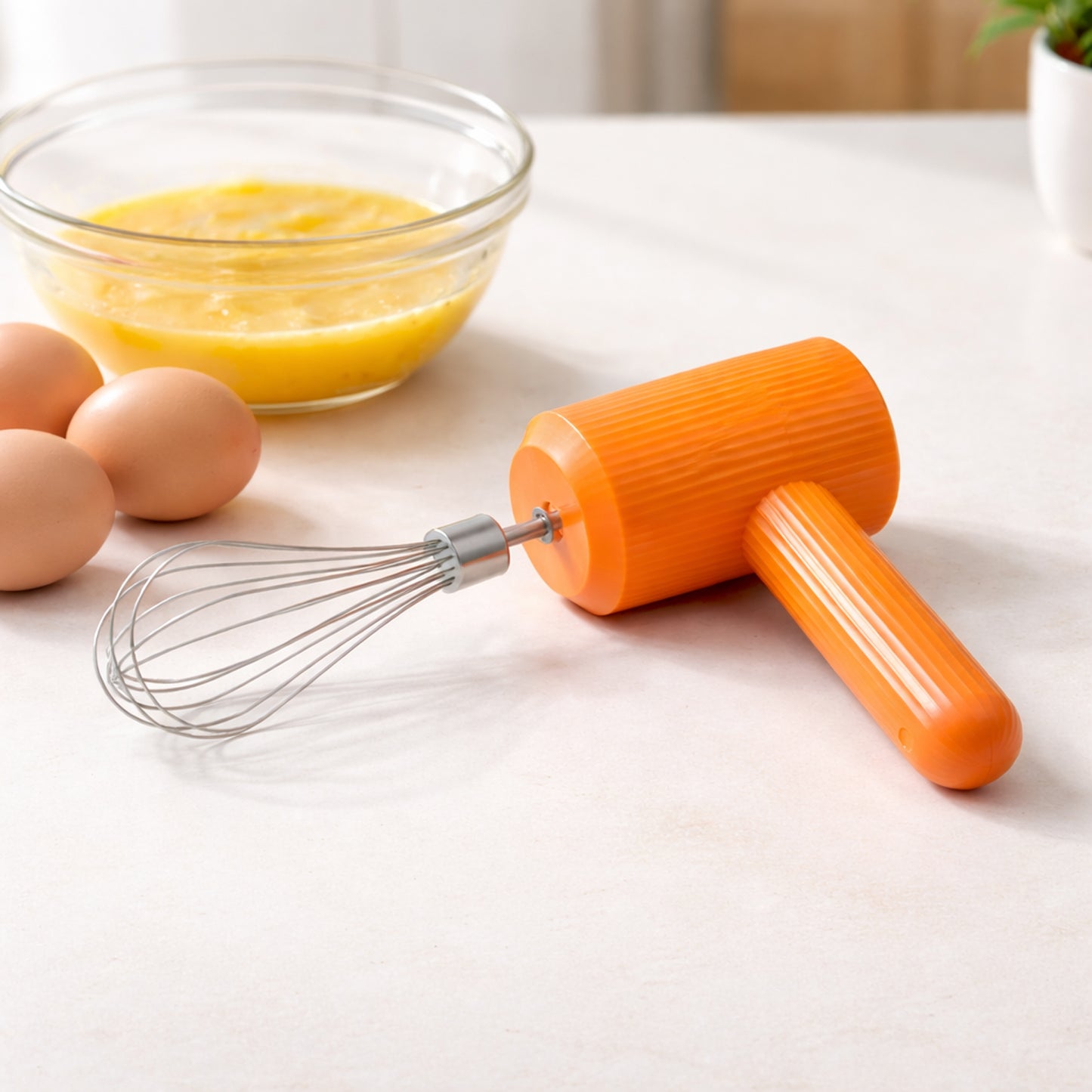 Wukusy portable USB rechargeable electric handheld whisk mixer with ergonomic handle and mixing attachments.