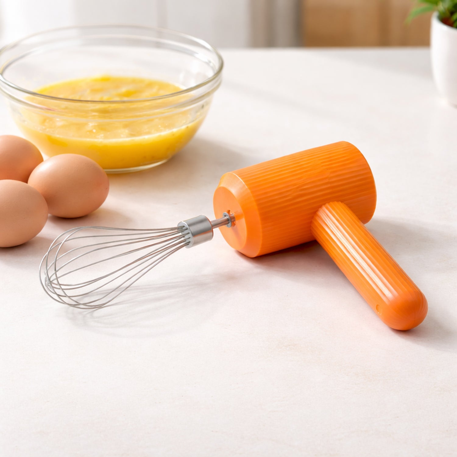 Wukusy portable USB rechargeable electric handheld whisk mixer with ergonomic handle and mixing attachments.