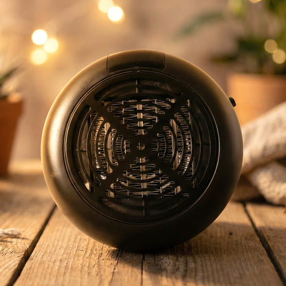Wukusy portable wall outlet electric room heater, 900W, compact design, mounted on wall for efficient home heating.
