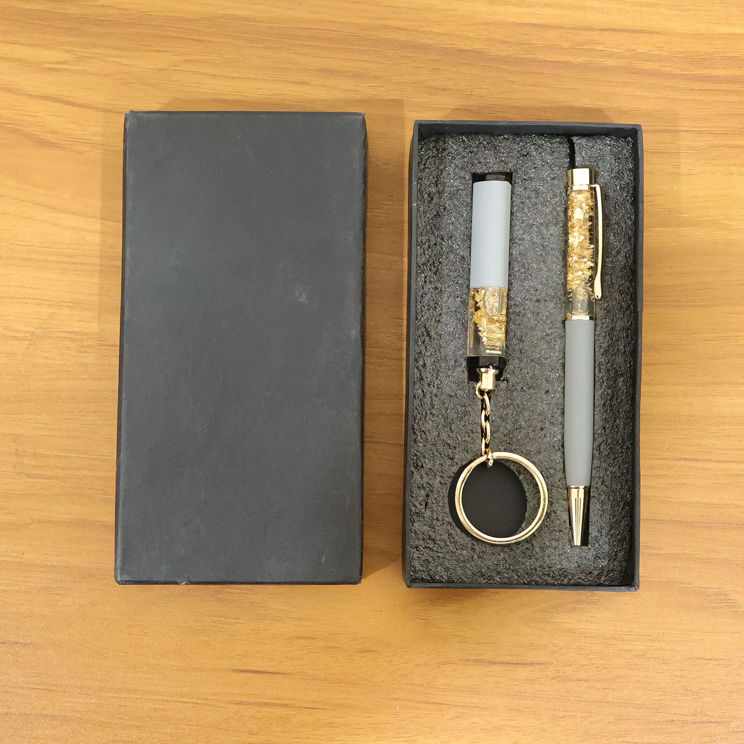 Wukusy Premium 2-in-1 keychain and pen combo gift set with sleek design and functional dual-use accessories.