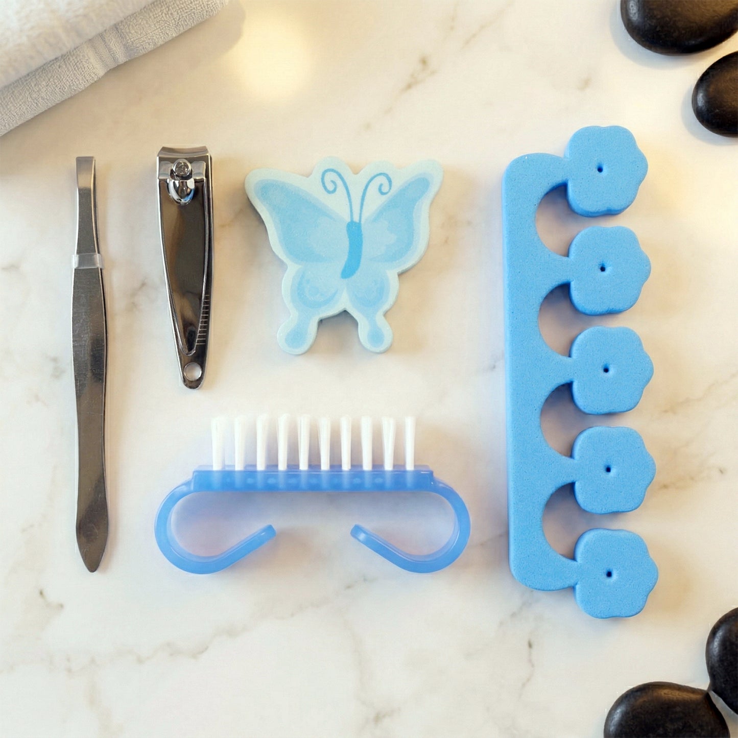 Wukusy Premium 5-in-1 Manicure Pedicure Kit with various tools for nail care and grooming in a compact set.