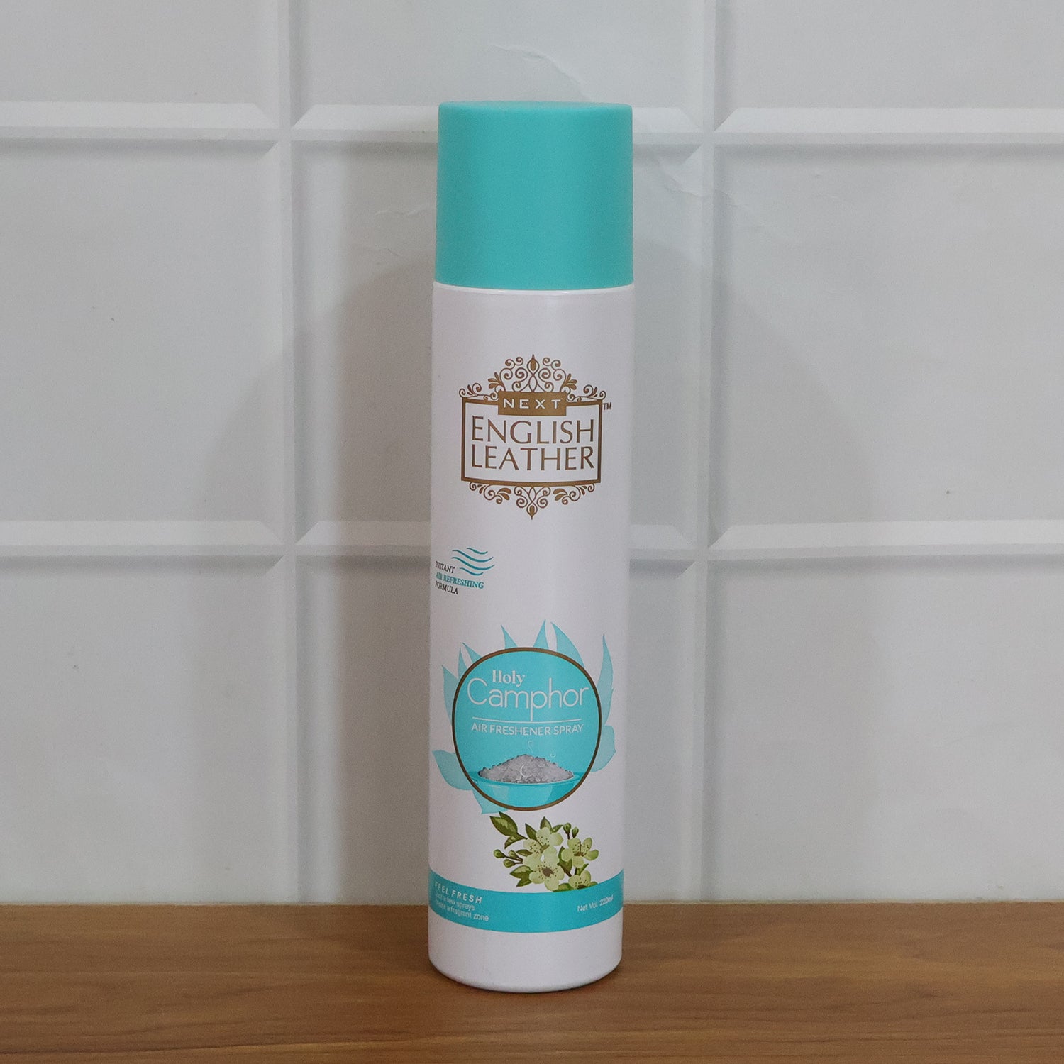 Wukusy Premium Air Freshener Spray with fresh mix fragrance, 220ml bottle, showcasing the spray nozzle and vibrant label.