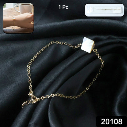 Elegant adjustable chain bracelet by Wukusy with mixed design, showcasing detailed metal links on a neutral background.