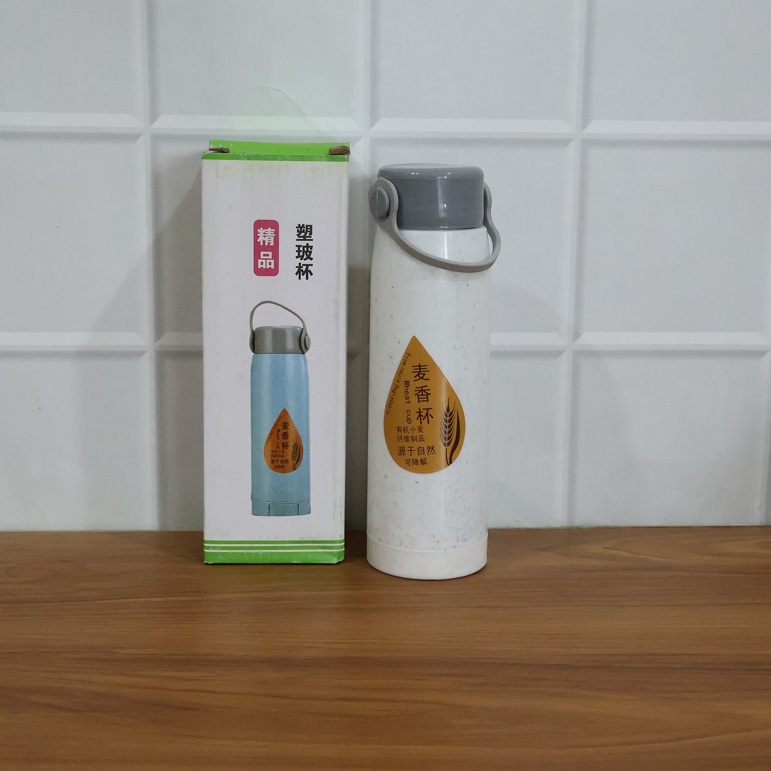 Wukusy premium glass water bottle with mobile phone holder, 380 ml, clear design, suitable for daily use and hydration.
