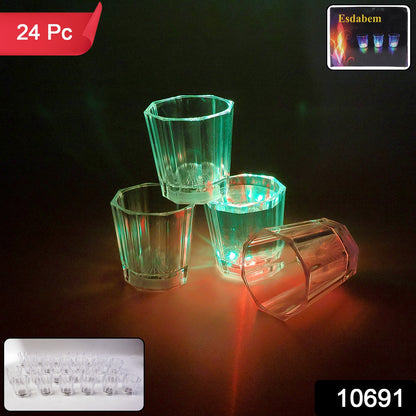 Wukusy premium LED light-up shot glass set with 24 colorful glow-in-the-dark shot glasses on a reflective surface.