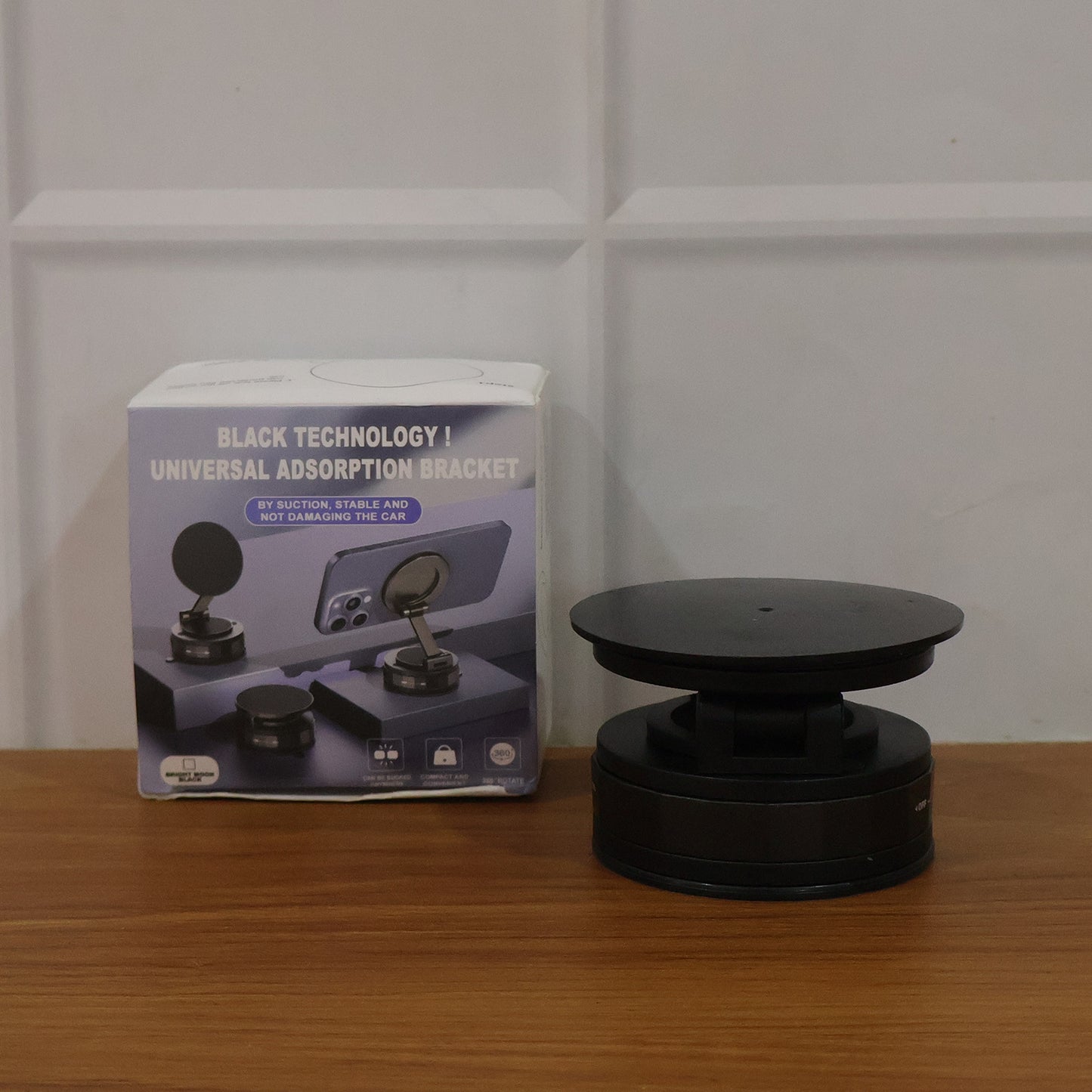 Wukusy premium magnetic mobile holder stand with a sleek design, holding a smartphone securely for easy viewing.