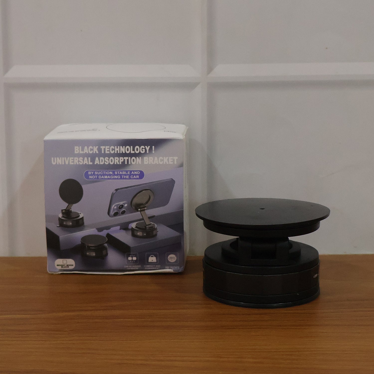 Wukusy premium magnetic mobile holder stand with a sleek design, holding a smartphone securely for easy viewing.
