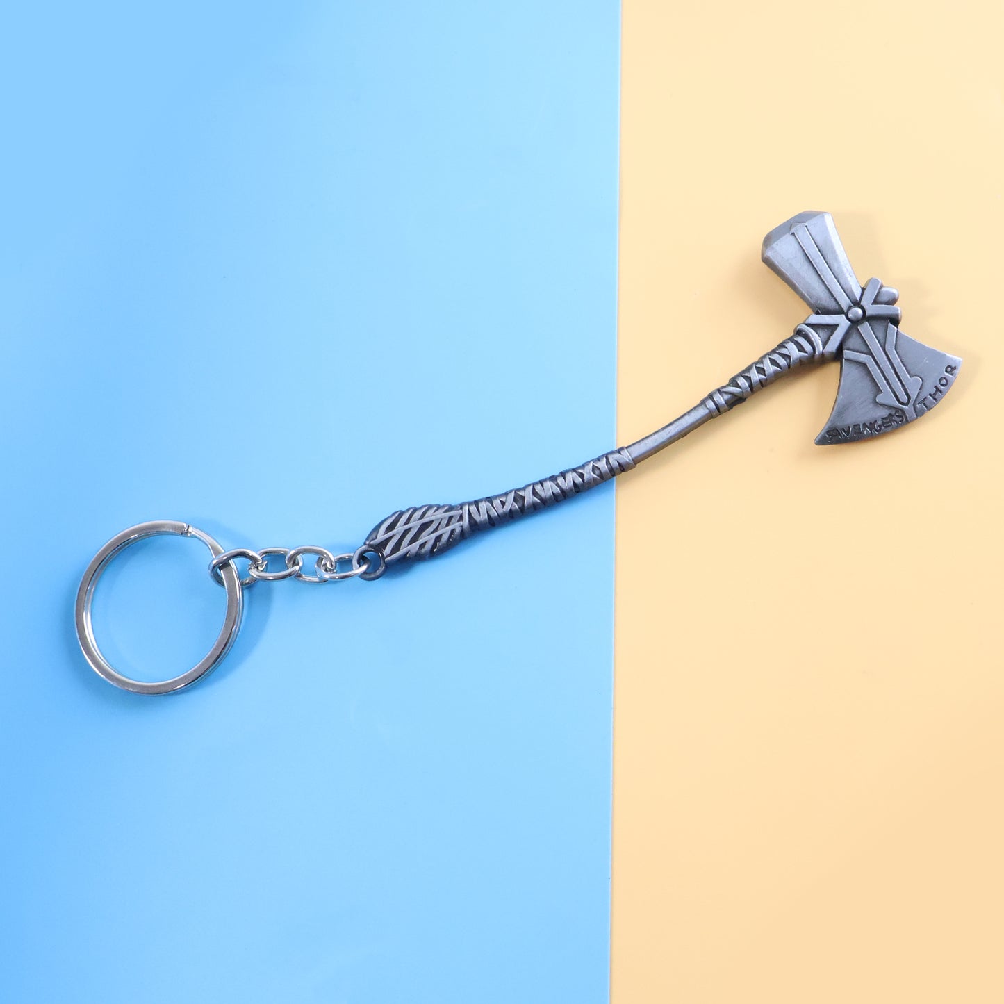 Wukusy premium metal axe keychain featuring a detailed axe design attached to a keyring.
