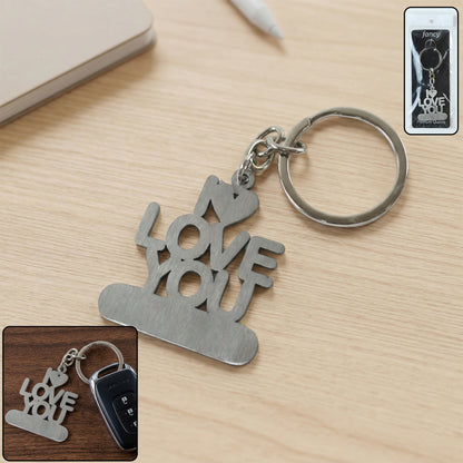 Wukusy Premium Metal Love You Keychain featuring a heart-shaped design and engraved "Love You" message, on a keyring.