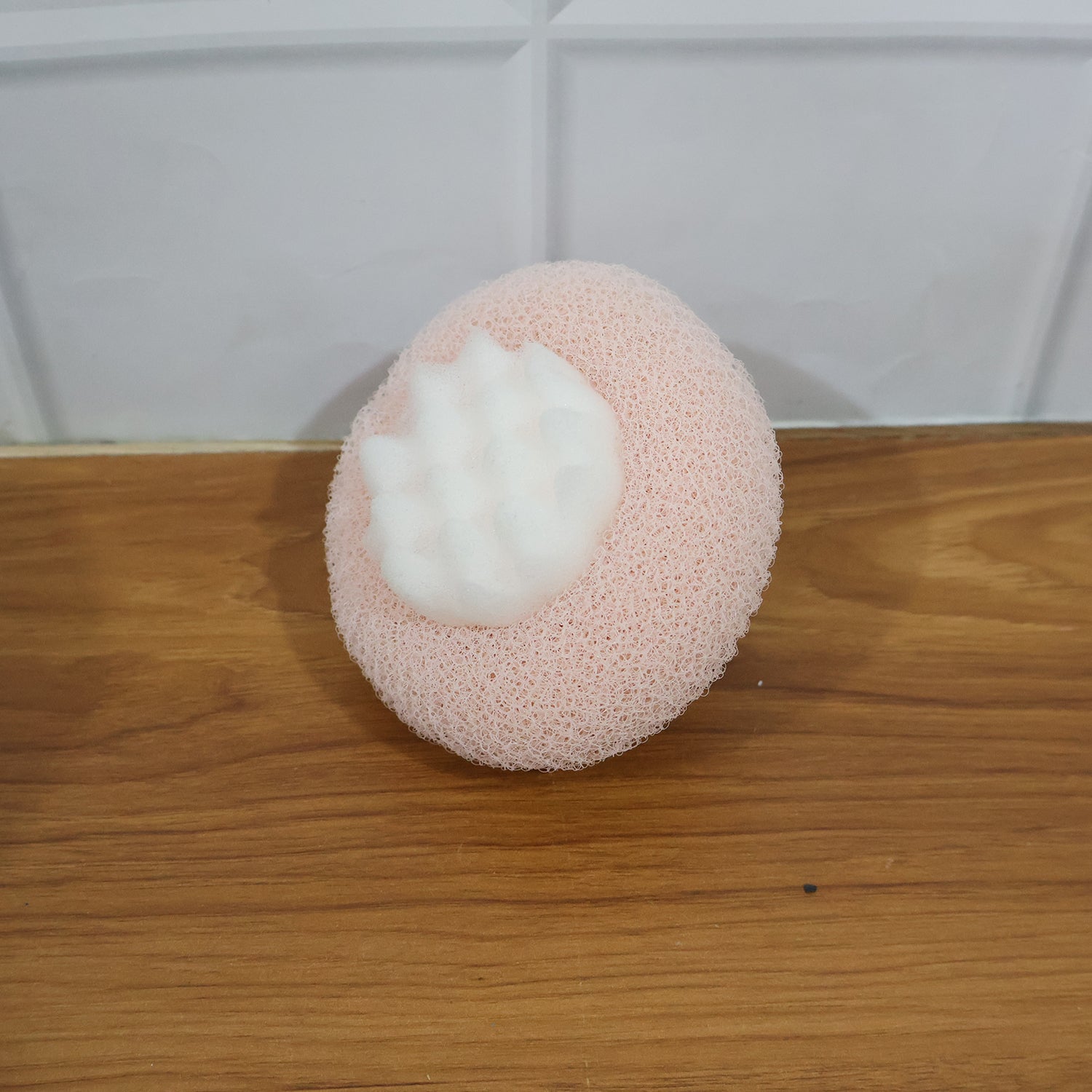 Wukusy Premium Soft Exfoliating Round Bath Scrubber for gentle skin cleansing and exfoliation in the shower.