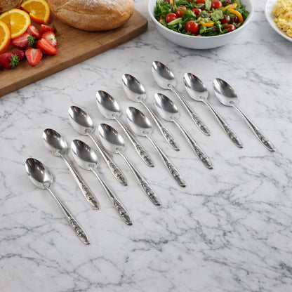 Wukusy premium stainless steel table spoons set of 12 arranged on a dining table, showcasing sleek and durable utensils for everyday use.