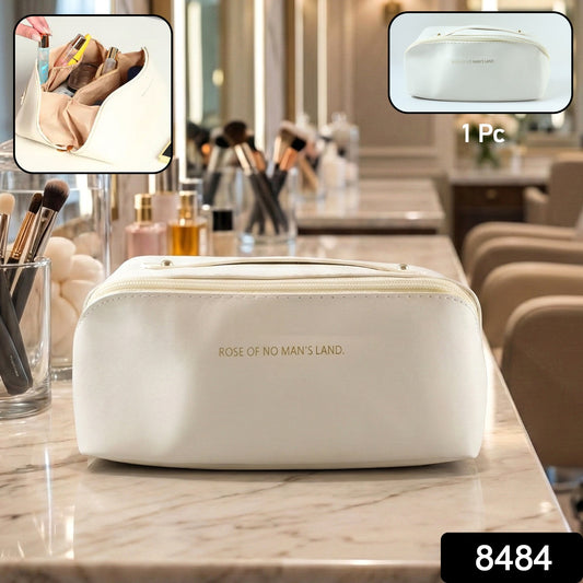 Wukusy premium travel makeup and toiletry organizer pouch with zipper and handle, ideal for compactly storing cosmetics and toiletries.