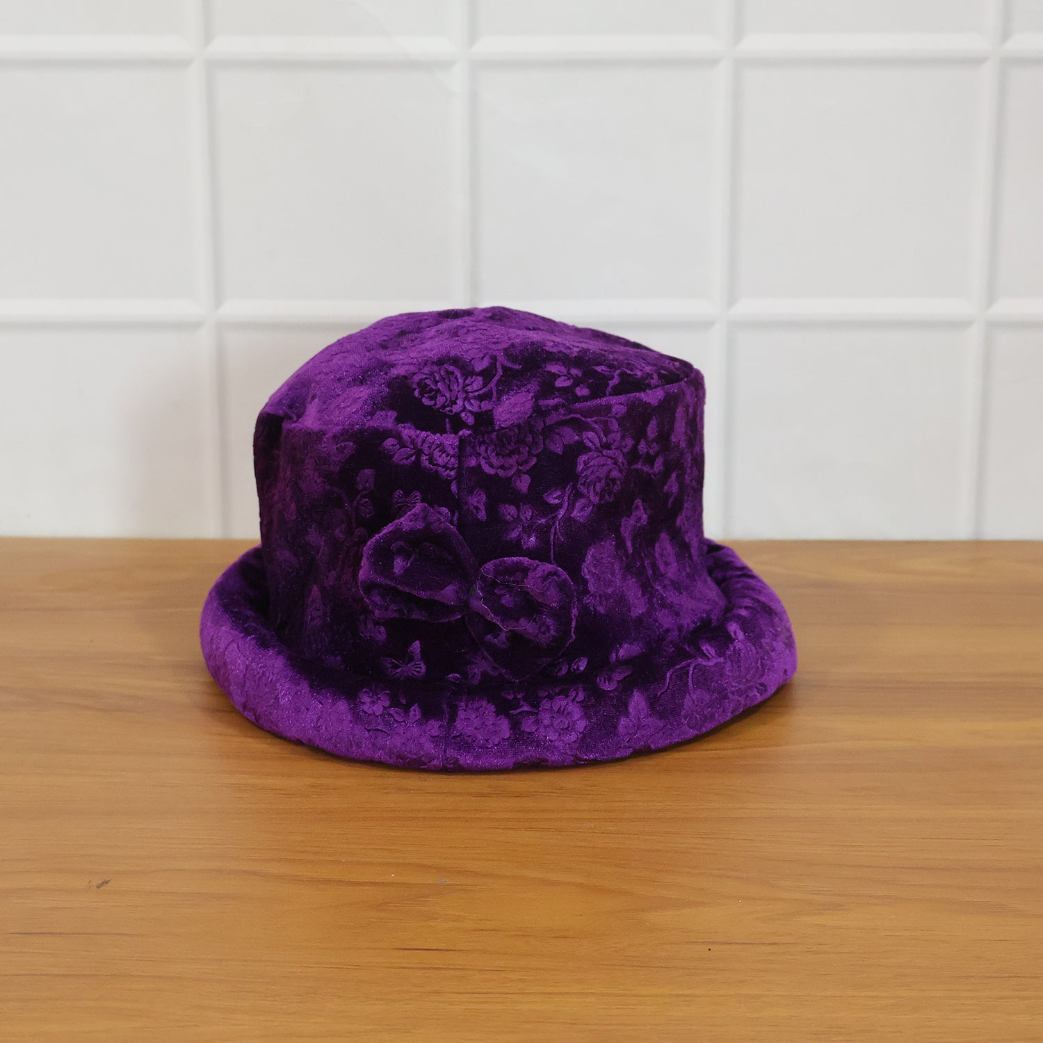 Wukusy premium velvet designer bucket hat for women, showcasing a stylish and soft velvet fabric with a wide brim.