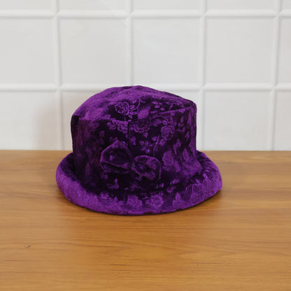 Wukusy premium velvet designer bucket hat for women, showcasing a stylish and soft velvet fabric with a wide brim.
