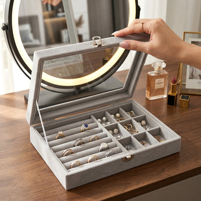 Wukusy premium velvet jewelry organizer box with transparent lid, featuring compartments for necklaces, rings, and earrings.