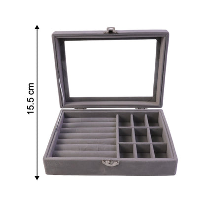 Wukusy premium velvet jewellery organizer box with transparent lid, showing multiple compartments for necklaces, rings, and earrings.
