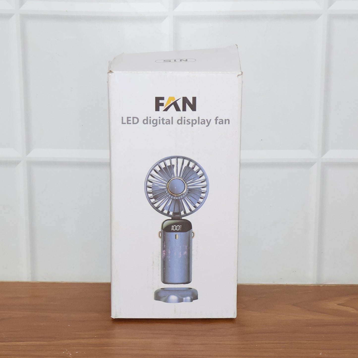 Wukusy rechargeable portable handheld fan, compact and lightweight with adjustable settings, ideal for outdoor use.