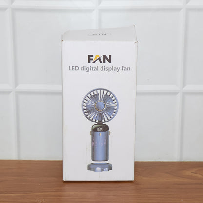 Wukusy rechargeable portable handheld fan, compact and lightweight with adjustable settings, ideal for outdoor use.