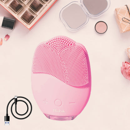 Wukusy rechargeable sonic silicone face cleansing brush with soft bristles for gentle skin cleansing and exfoliation.
