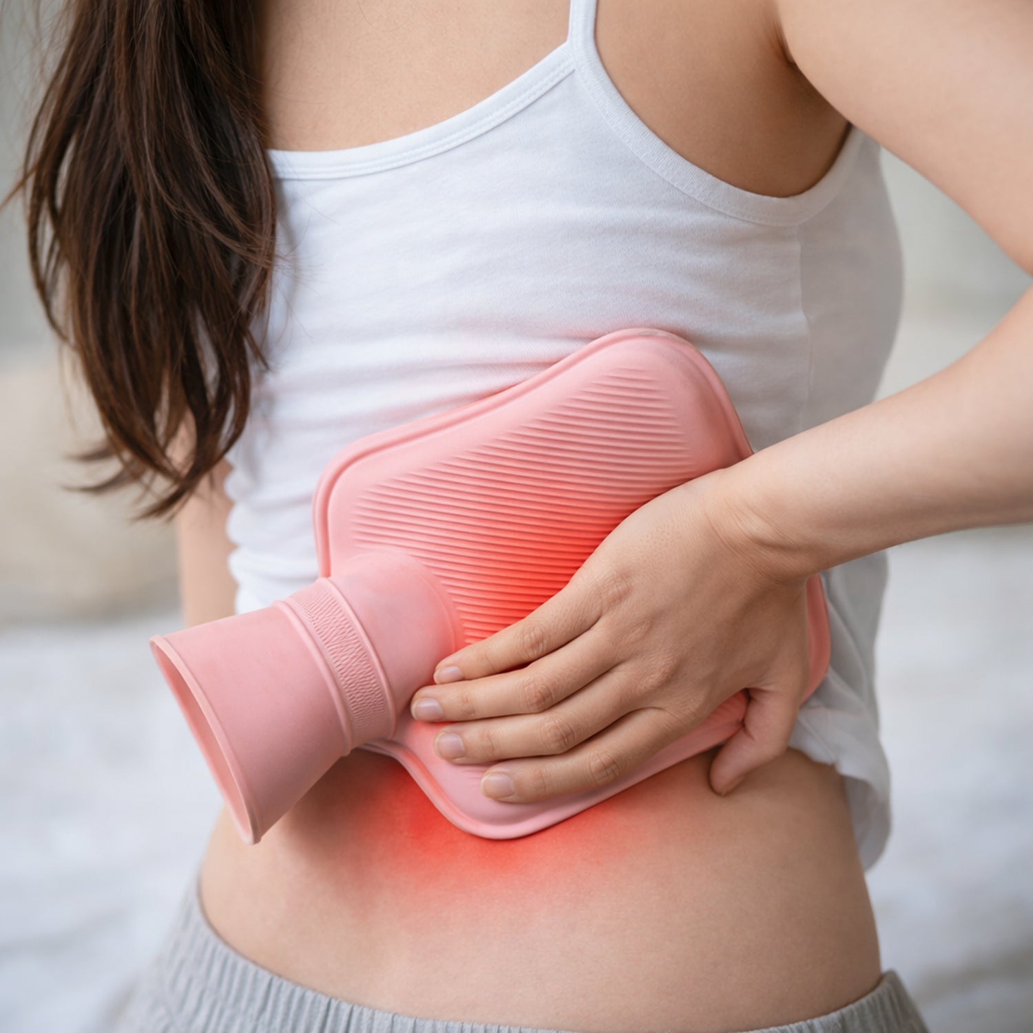 Wukusy reusable hot water bag for pain relief, warm compress therapy, shown in a neutral setting on a plain background.