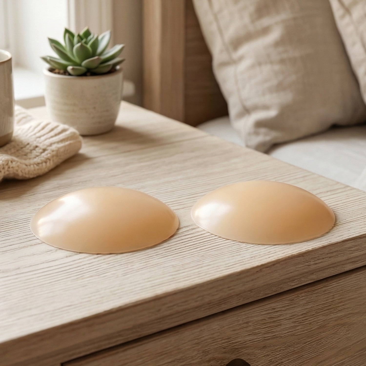 Reusable silicone nipple cover patches by Wukusy, 2-pack, showing soft, skin-toned silicone covers for discreet support and comfort.