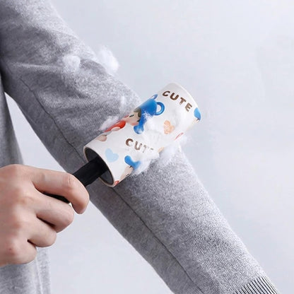 Wukusy reusable sticky lint roller with handle, shown in use for removing lint and pet hair from clothing and fabrics.