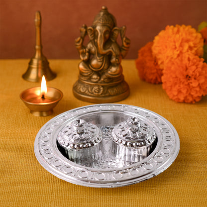 Small round Wukusy Puja Thali Kumkum holder, traditional metal plate for religious rituals and offerings.