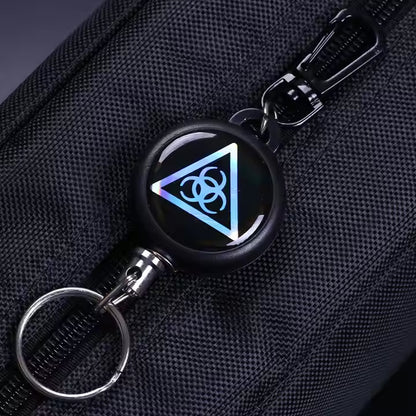 Wukusy small safety anti-lost retractable key chain with clip and cord for secure key holding and easy access.