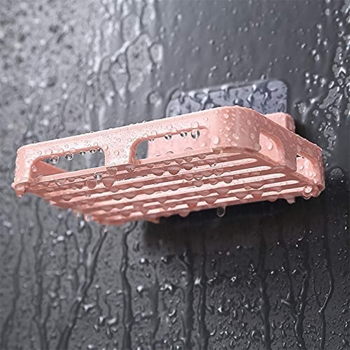 Wukusy self-adhesive rectangular soap dish holder mounted on a bathroom wall, designed for convenient soap storage and drainage.