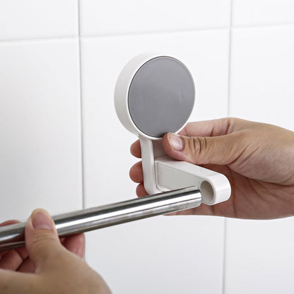 Self-adhesive towel rod rack by Wukusy mounted on bathroom wall, showing sleek design and easy installation.