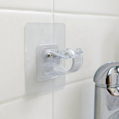 Transparent self-adhesive wall hook holder clip by Wukusy, suitable for hanging lightweight items on smooth surfaces.
