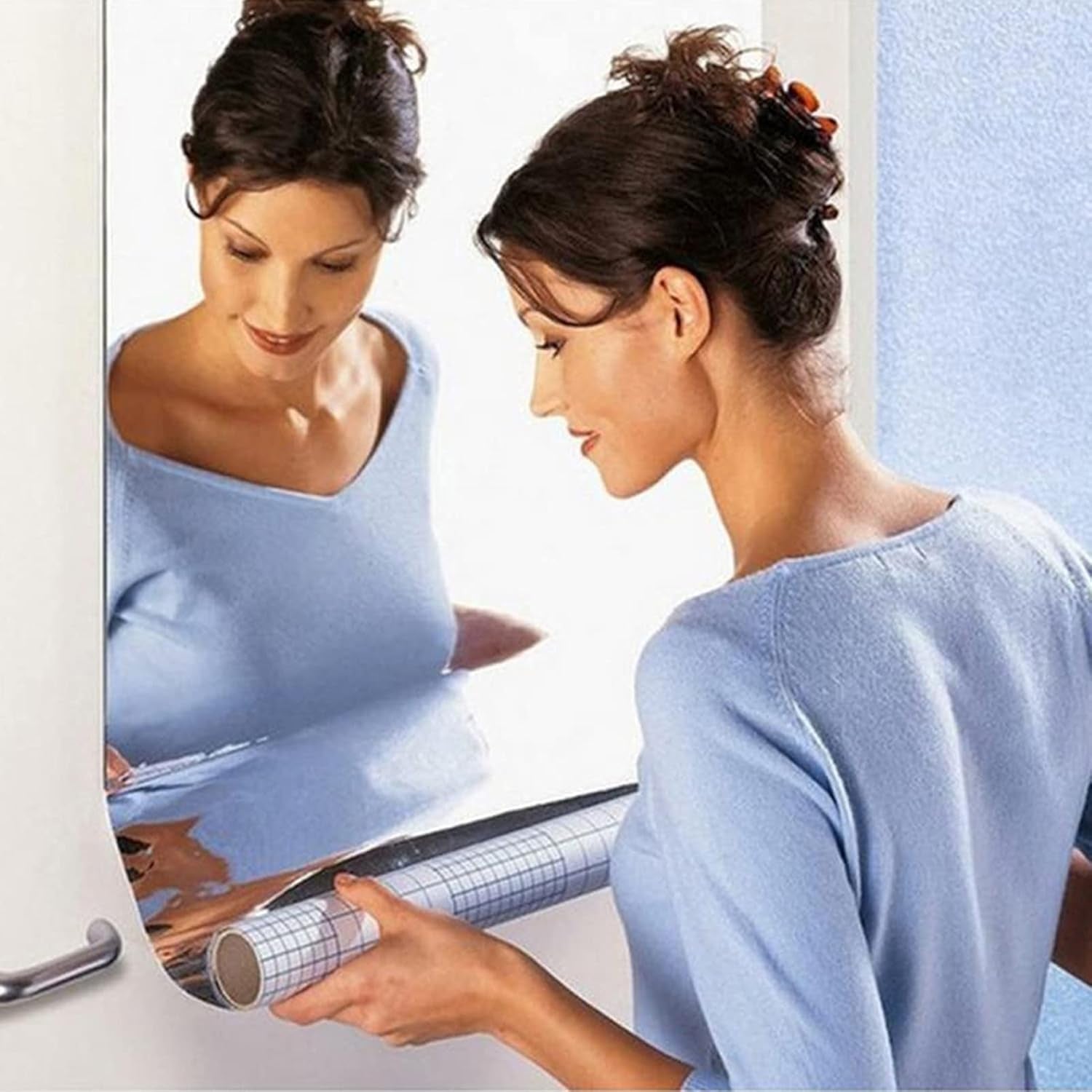 Wukusy self-adhesive wall mirror sheet, 100x50 cm, with reflective glass surface and adhesive backing for easy installation.