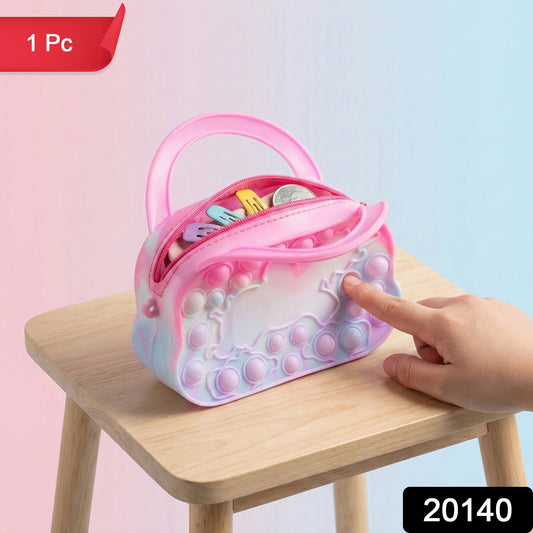 Wukusy silicone Pop It coin purse with zipper and handle, small, colorful, and soft for easy carrying and fun fidgeting.