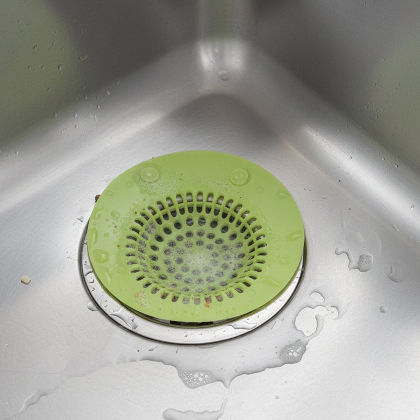 Wukusy silicone sink drain strainer in black, designed to catch debris and prevent clogs in kitchen sinks.