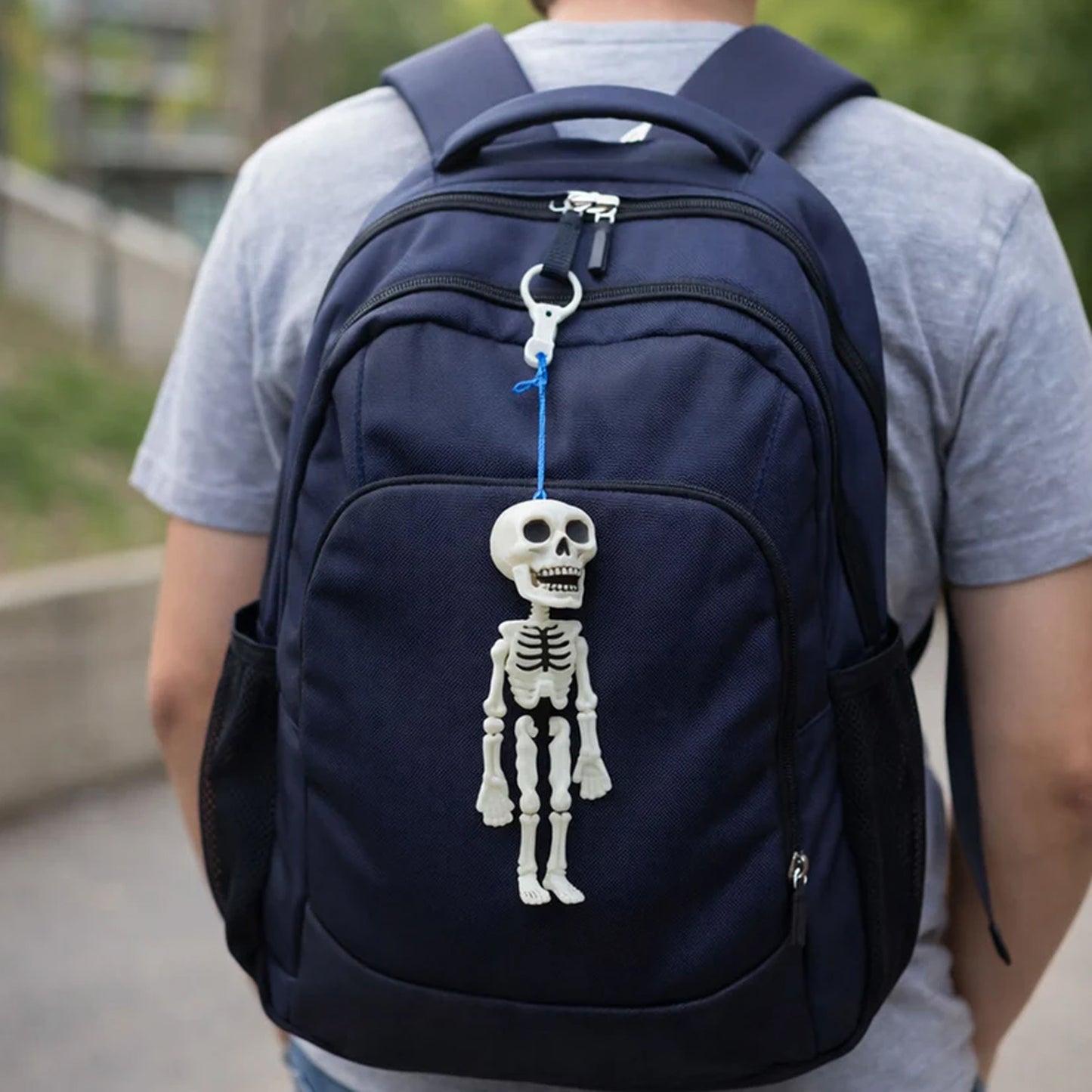 Two Wukusy skeleton doll keychains with metal hooks, featuring detailed skeletal design on durable keychain accessories.