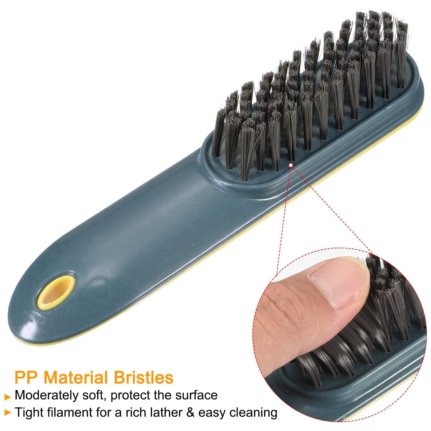 Wukusy small cleaning brush for shoes and clothes, compact and effective for dirt removal on various fabrics and surfaces.