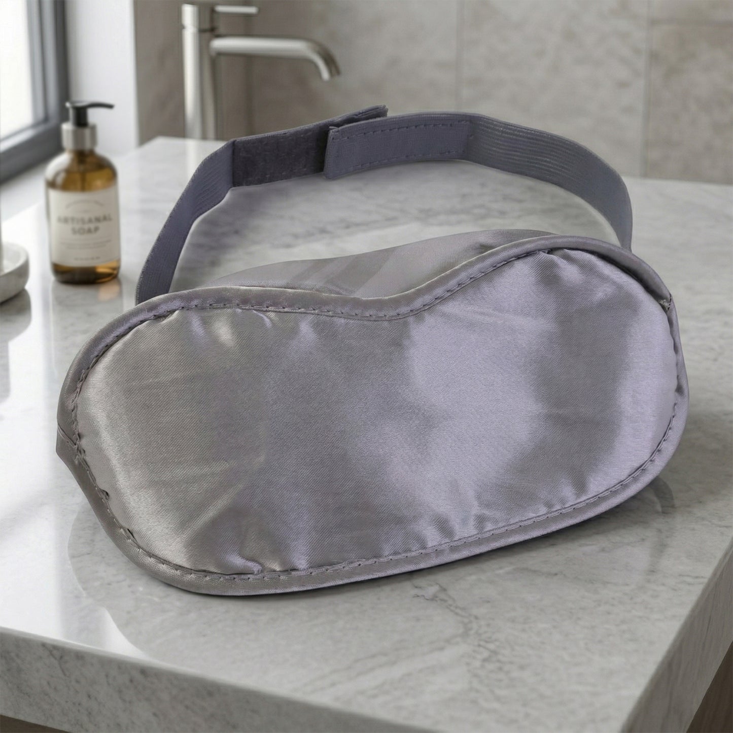 Soft, comfortable Wukusy sleep eye mask on a white background, designed for blocking light and improving sleep.