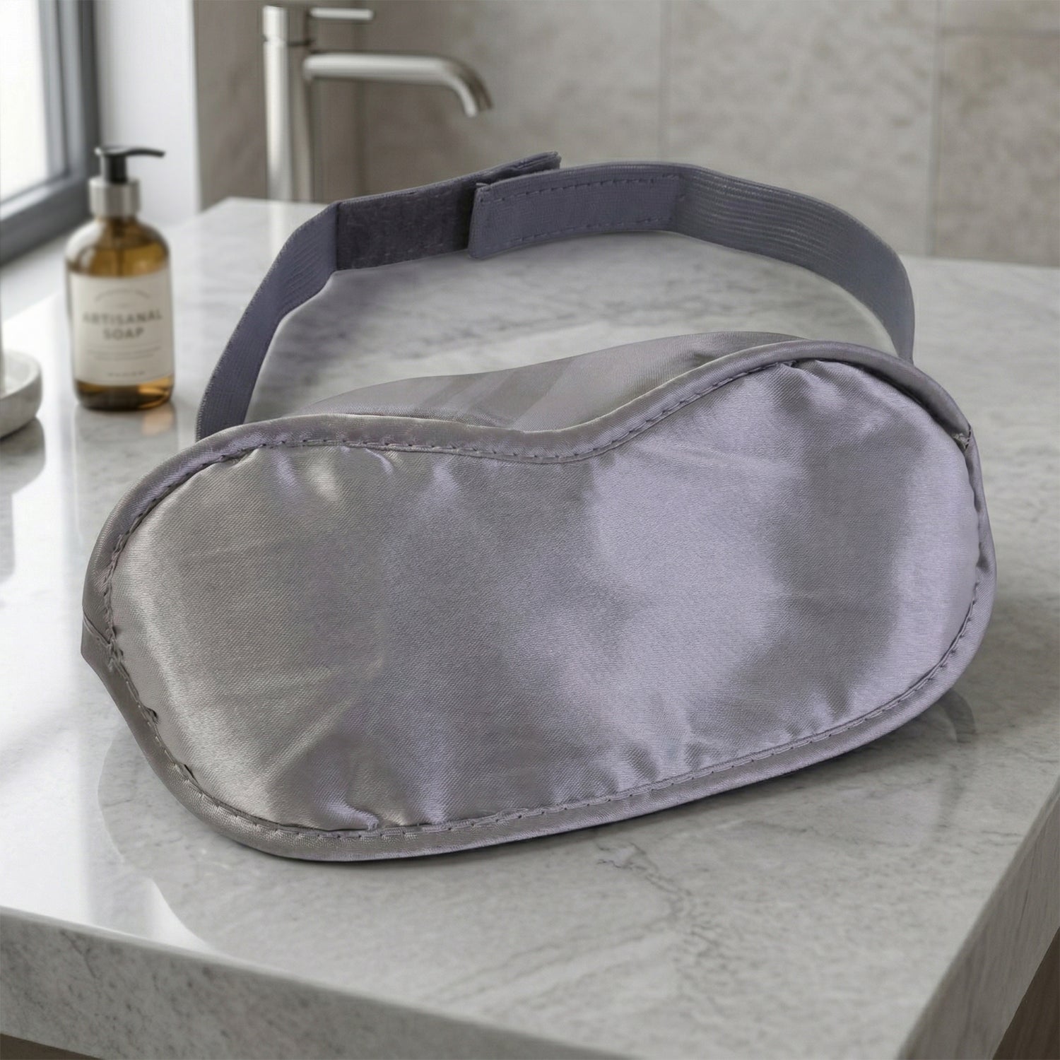 Soft, comfortable Wukusy sleep eye mask on a white background, designed for blocking light and improving sleep.