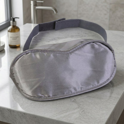 Soft, comfortable Wukusy sleep eye mask on a white background, designed for blocking light and improving sleep.