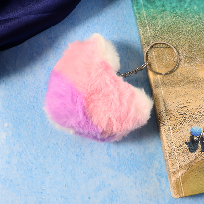 Soft plush heart-shaped keychain by Wukusy, featuring a cute design, attached to a keyring, perfect for accessorizing keys or bags.