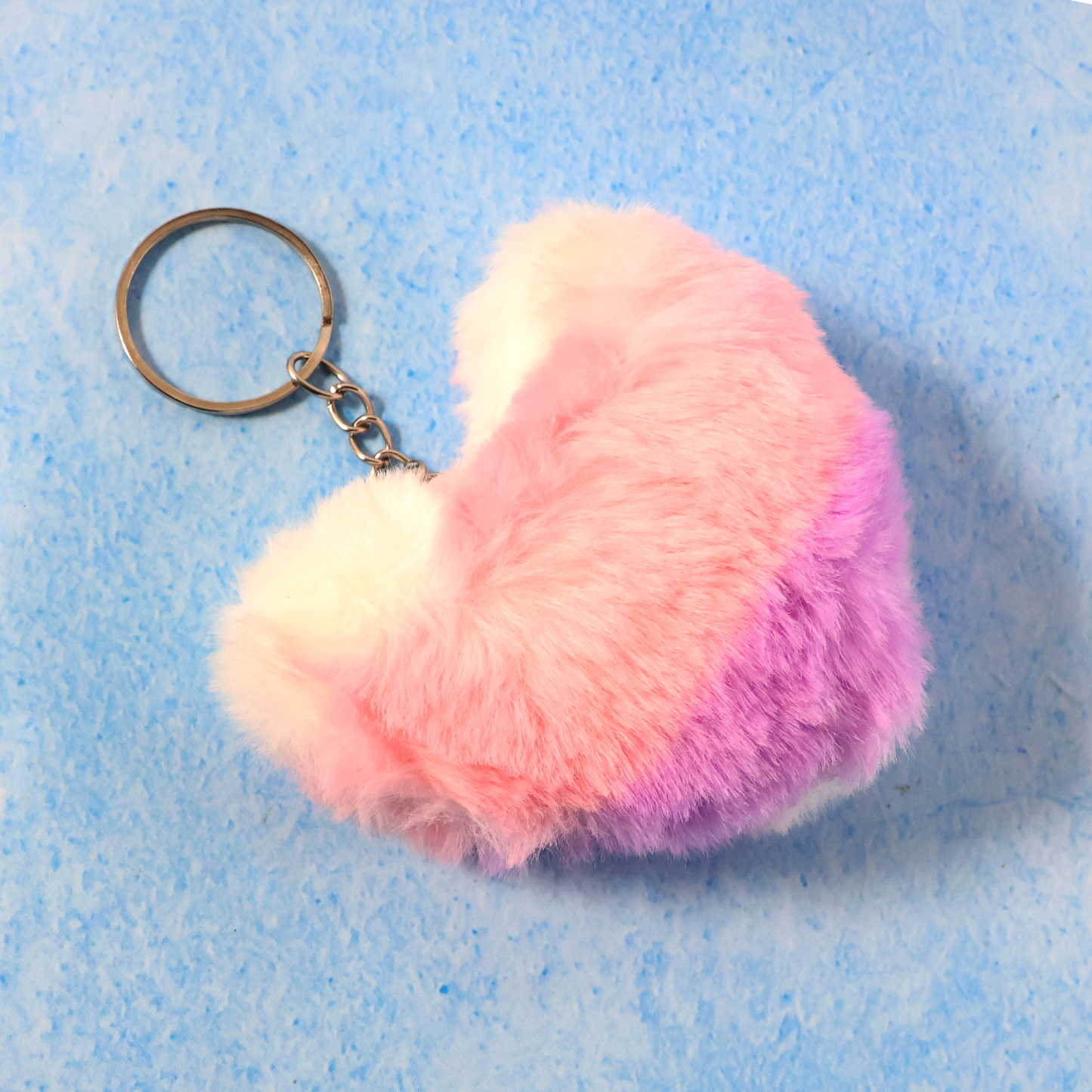 Soft plush heart keychain by Wukusy, featuring a cute, colorful plush heart attached to a keyring.
