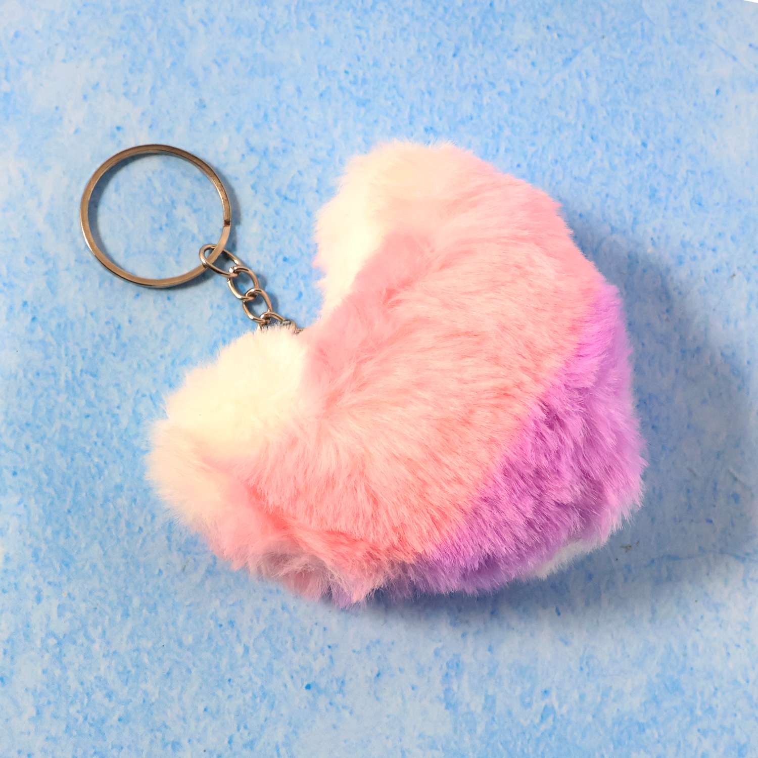 Soft plush heart keychain by Wukusy, featuring a cute, colorful plush heart attached to a keyring.