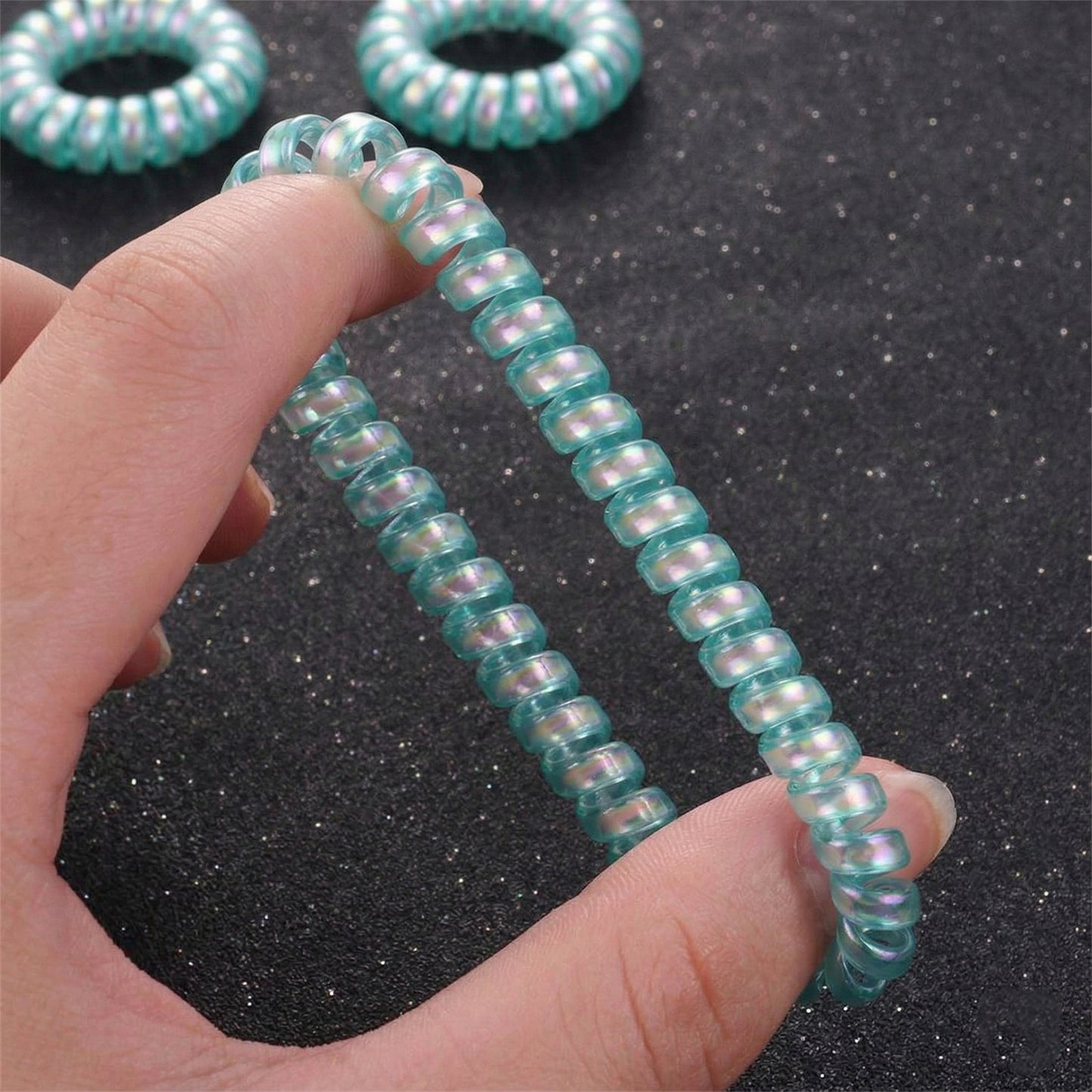 Set of five colorful Wukusy soft stretchable telephone wire style hair bands, ideal for gentle hair styling and secure hold.