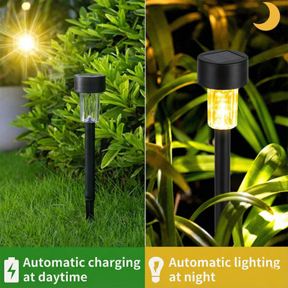 Wukusy solar-powered lawn pathway light set with 12 black stake lights illuminating garden walkways at night