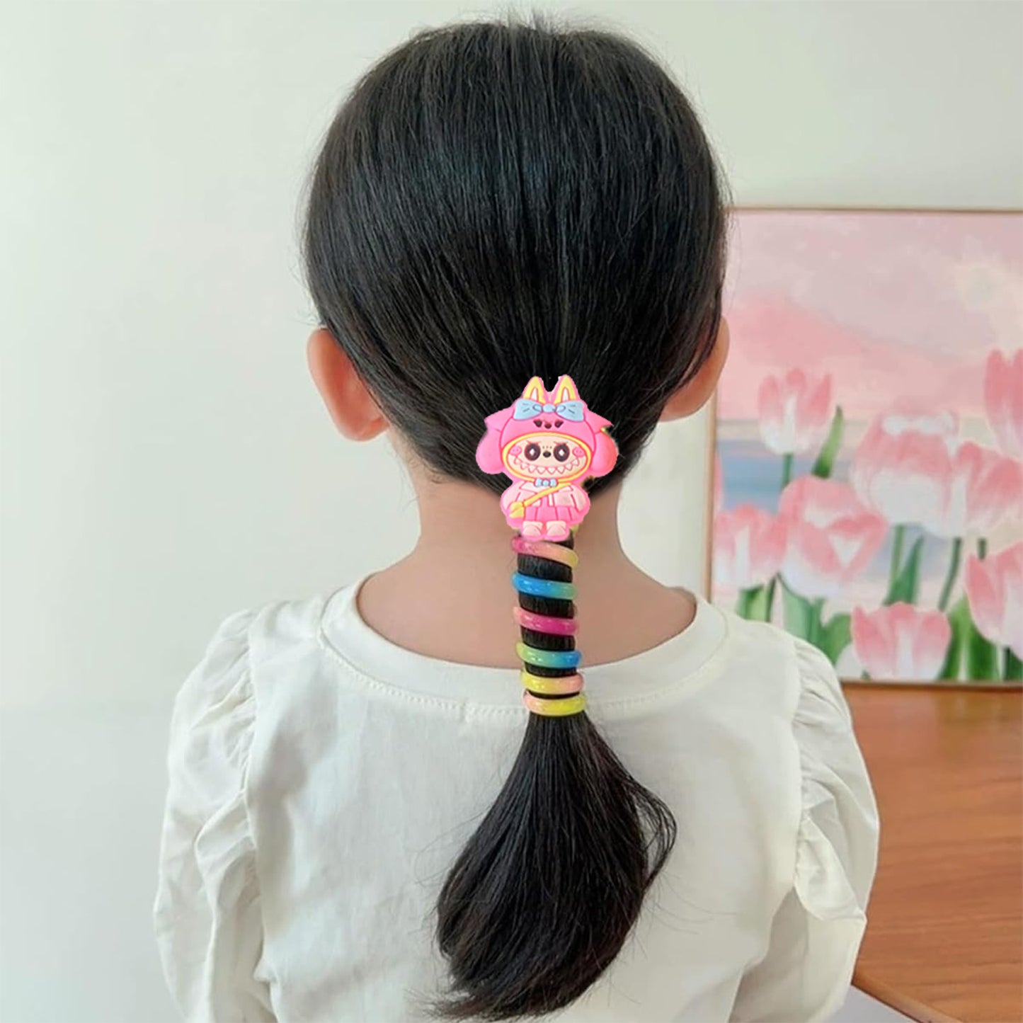 Set of 12 Wukusy spiral hair braiding clips for kids with colorful mix designs, ideal for easy hair styling.