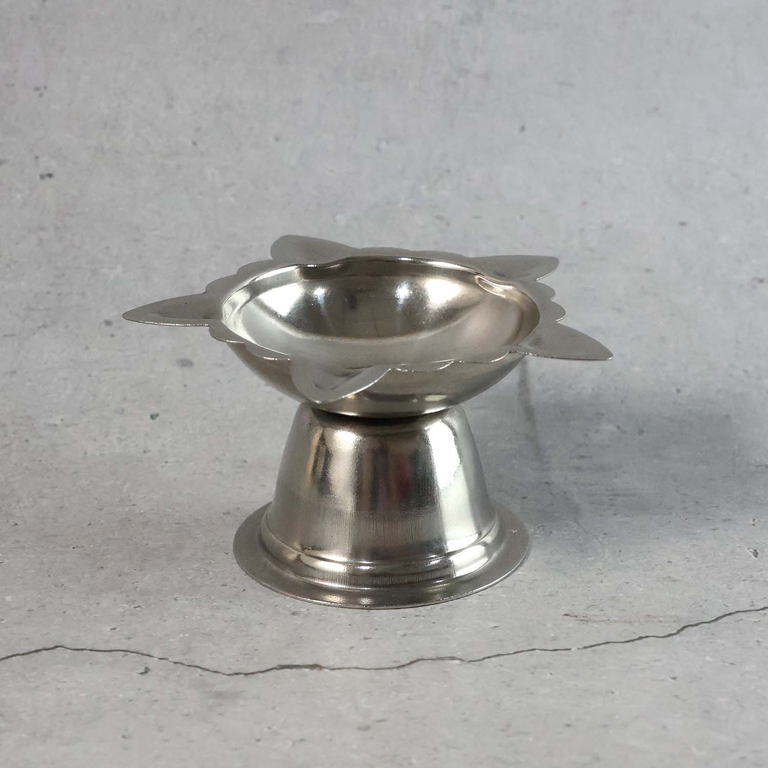 Big stainless steel sunflower design diya stand by Wukusy, decorative and durable for festive lighting displays.