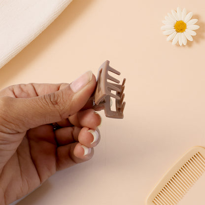 Set of 12 stylish mini Wukusy hair claw clips with various designs, perfect for securing small sections of hair.