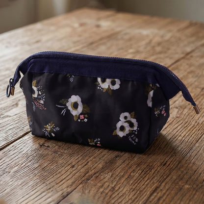 Wukusy stylish multipurpose cosmetic storage pouch bag, 18x12 cm, with zipper closure and compact design for travel and organization.