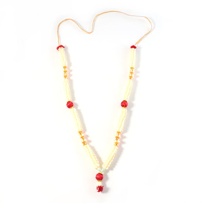 Traditional decorative Pooja Gajra garland from Wukusy, showcasing vibrant floral design for religious ceremonies.